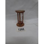 A Mauchlin ware egg timer