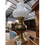 A brass oil lamp converted to electric