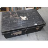 A metal cabin trunk marked American steel