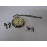 A Acme lever silver cased pocket watch with 2 keys and silver chain
