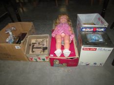 A child's Singer sewing machine, a Chad valley toy washing machine, A talkative Jane doll,
