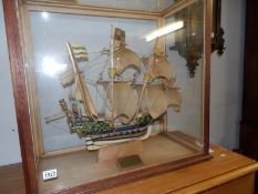 A cased model of a galleon