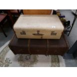 A cabin trunk and a suitcase