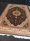 A blue ground Keshan carpet,