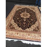 A blue ground Keshan carpet,