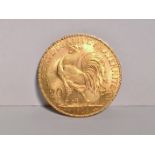 A French Republic 1908 gold 20 francs coin,