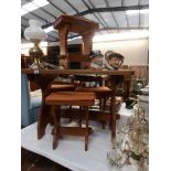 A rustic oak table and 4 stools