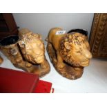 A pair of art deco plaster lion planters