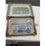 A framed and glazed old £1 note and 2 East African bank notes