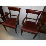 A pair of Victorian mahogany carver chairs