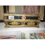 An Italian gilt and painted jewellery cabinet