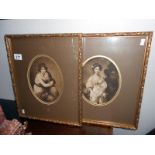 A pair of framed and glazed oval prints