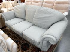 A green brocade 3 seat sofa