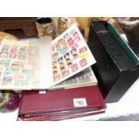 3 albums of stamps and a German bible
