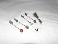 10 low grade silver cocktail sticks and 4 low grade agate topped silver spoons