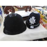A 1970's Northamptonshire police helmet and a 1960's Northampton county night police helmet