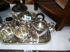 A 4 piece silver plated tea set including tray and 2 other items of tea ware