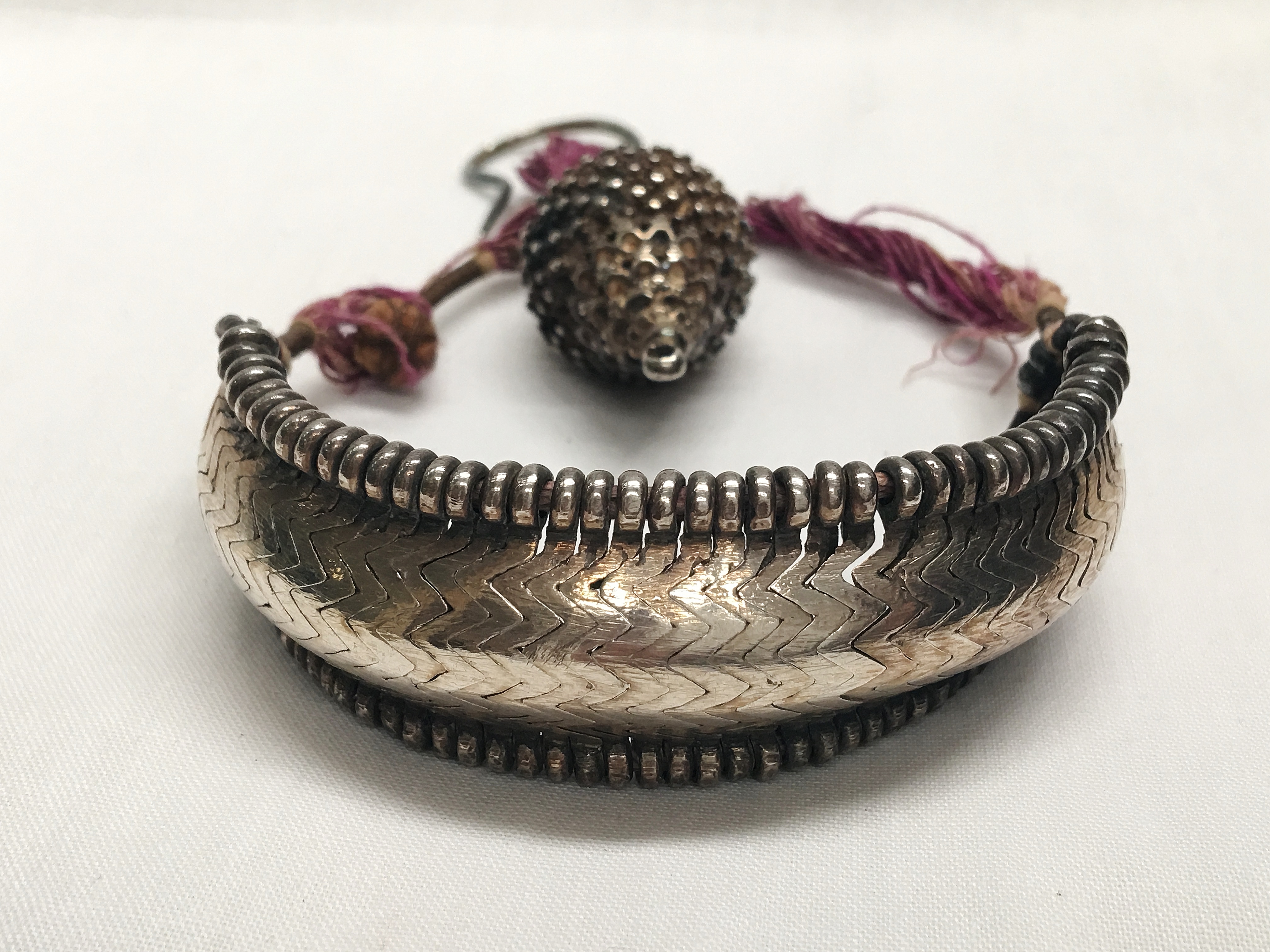 A rare antique silver coloured metal reticulated wrist bangle, - Image 2 of 6