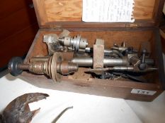 A quantity of watch makers tools including lathe
