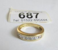 An 18ct gold and diamond ring size L