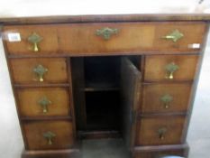 An 18th century walnut kneehole desk with original purchase invoice from the 1978,