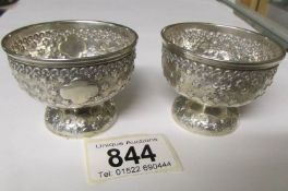 A pair of 1872 silver footed salts