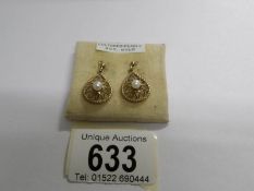 A pair of 9ct gold vintage pendant drop earrings set cultured pearls