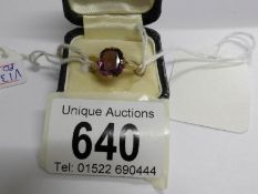 A 9ct gold ring set amethyst,