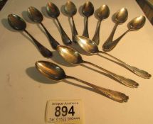 11 silver (800) teaspoons,