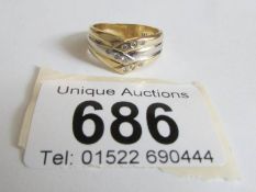 An 18ct gold and diamond ring size N
