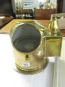 A brass binnacle compass