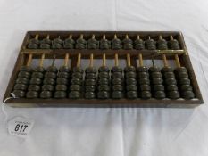 An 18th century Chinese abacus (Aloes wood?),