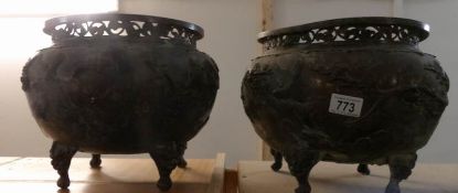 A pair of early 19th century Japanese bronze jardinieres