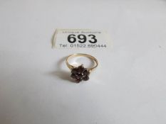A 9ct gold garnet cluster ring,