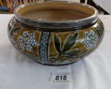 A salt glaze fruit bowl with silver rim