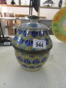 A hand painted 19th century lidded pot marked F E S,