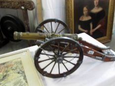 A large model of a Louis XIV cannon