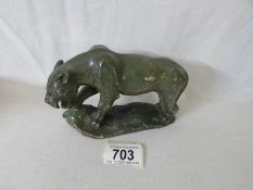 A carved soapstone jaguar (approx 10cm high,
