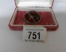 A silver Scottish banded agate and silver brooch