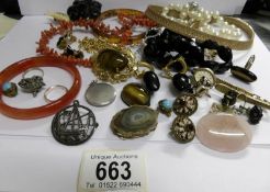 A mixed lot of vintage jewellery including silver, jet,