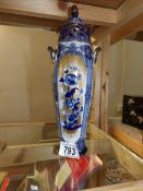 A blue and white gilded Burslem Bourbon lidded vase