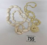 2 ivory necklaces