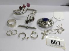 A collection of silver jewellery including bangle, brooch etc,