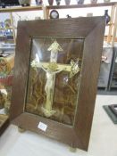 A framed and glazed good quality crucifix with concave glass