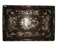 An 18th/19th century Chinese hardwood tray with mother of pearl inlaid butterfly and floral design