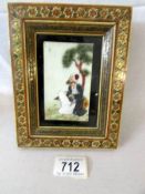 A small 19th century framed and glazed oriental hand painting on ivory