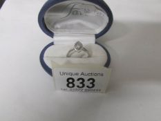 A marquis shaped 18ct white gold diamond ring size M
