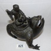 A 19th century Chinese bronze three legged toad pot ridden by Liu Hai (missing hand)