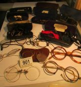 A collection of 19th century and later spectacles and pince nez including gold rimmed,