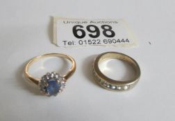 A 10k gold oval sapphire ring size N and one other size L